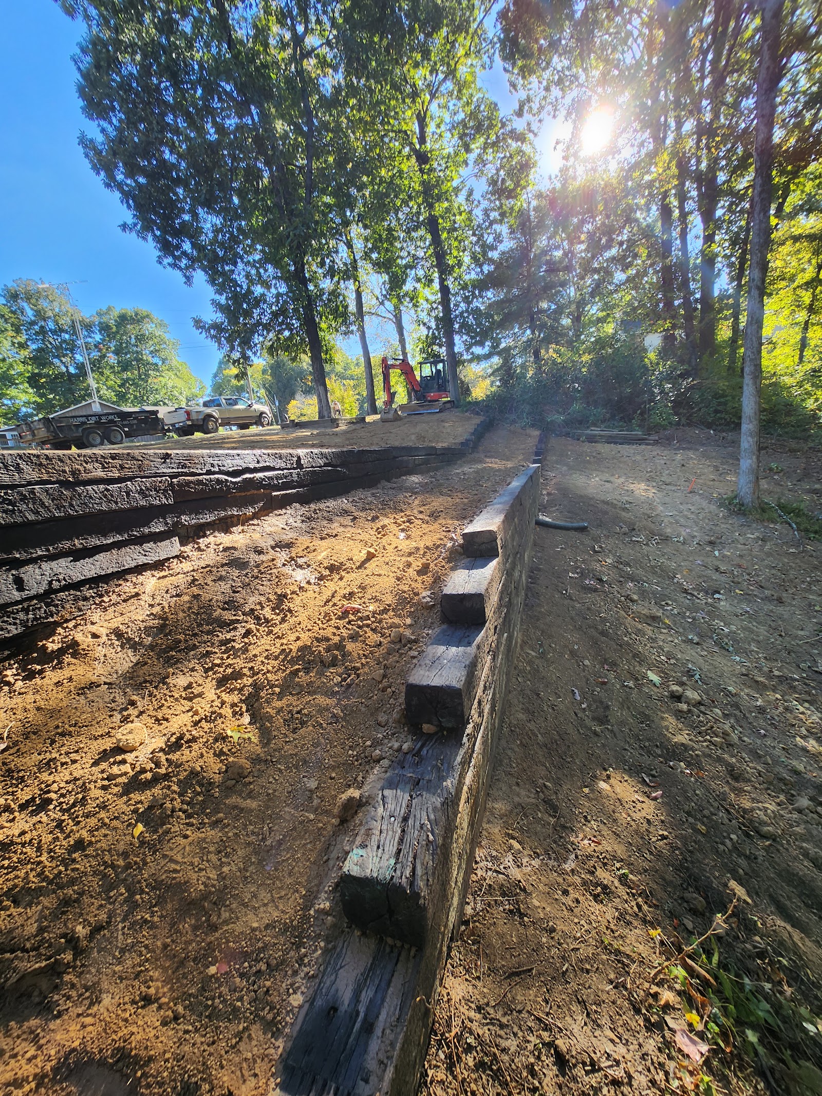 Retaining wall with drainage trench during construction